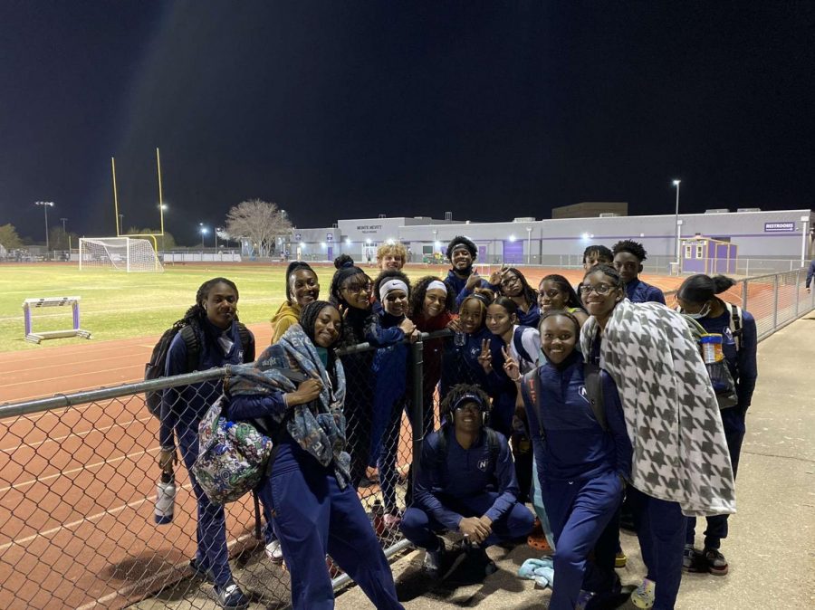 Nevada Track Club huddle together for a picture after a long meet in Phoenix.