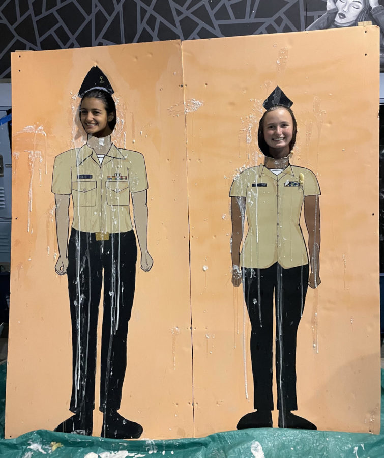 The top two ROTC cadets standing in their first booth at the Harvest Festival on Oct. 28, 2021.
