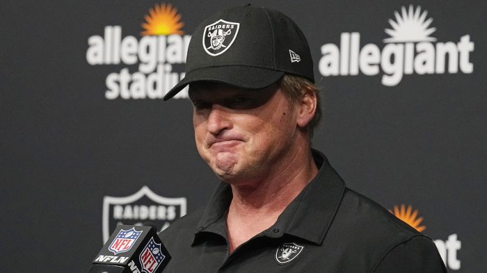 Jon+Gruden+during+a+press+conference+after+a+game.