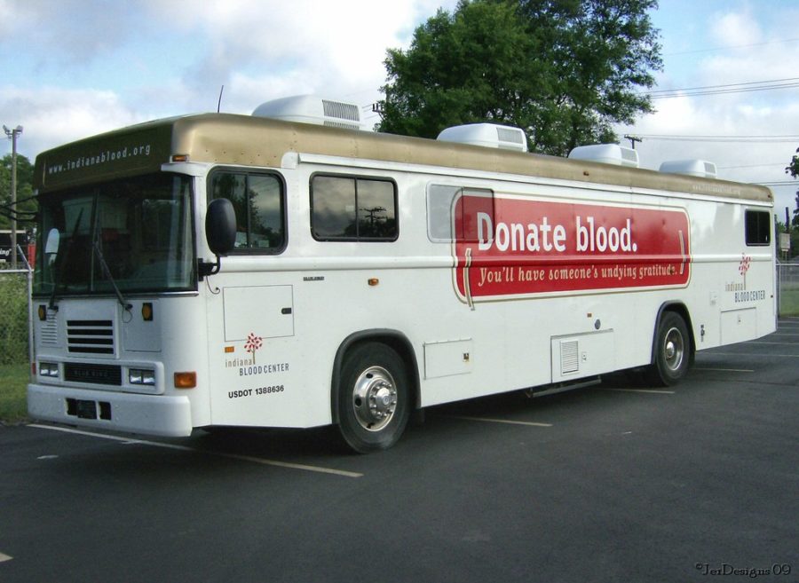 A blood drive company stops by and makes it possible for people to donate.