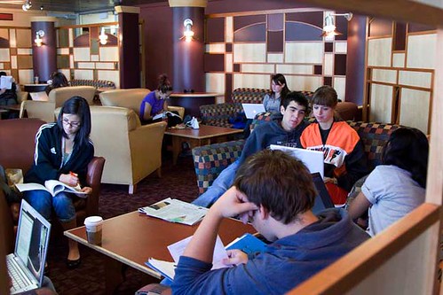 Denver college students studying hard to achieve full school potential.