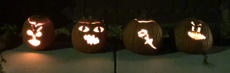Children+enjoy+carving+pumpkins+for+Halloween+fun.
