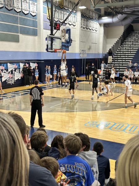Varsity Basketball Game Slam Dunk